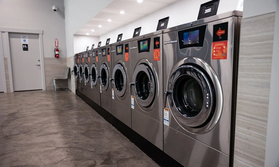 Laverie Automatique À Pièces En Pleine Croissance Avec Un Bien Immobilier 1